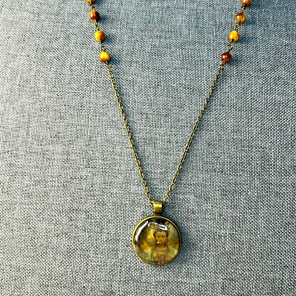Minimalist Kuan Yin necklace Cats Eyes Reticulated Quartz Necklace
